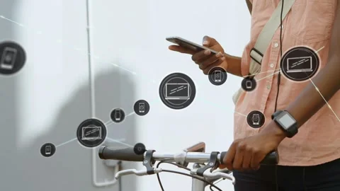 Animation of connected icons over midsection of african american man on bicycle Stock Footage 329699430