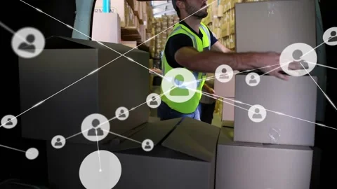 Animation of connected profile icons over caucasian coworkers loading boxes in Stock Footage 327707996