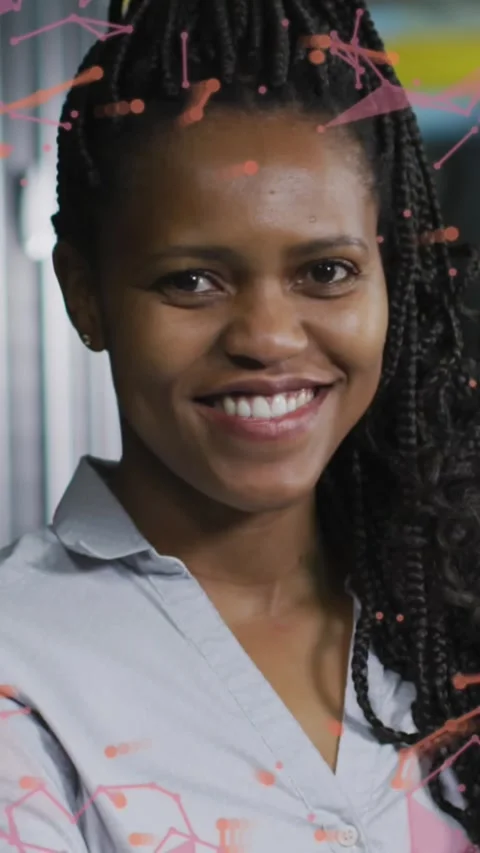 Animation of connections over happy african american woman posing in server room Stock Footage 324021753