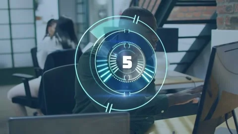 Animation of counting over african american man using computer Stock Footage 329516017