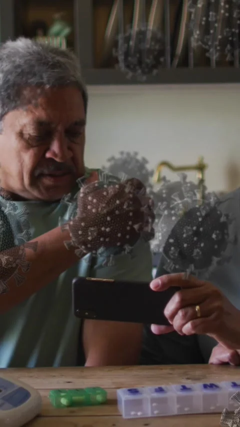 Animation of covid 19 cells over senior couple using smartphone at home Vídeo Stock 342004062