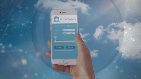 Animation of cropped hand using mobile banking app in cellphone over abstract Stock Footage 315949167