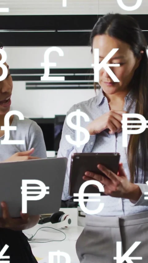Animation of currency icons and data processing over diverse businesspeople in Stock Footage 344331934