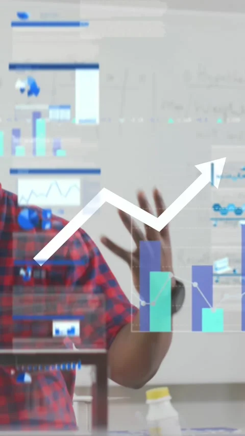 Animation of data with graphs and charts against african tutor teaching biology Stock Footage 343738567