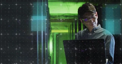 Animation of data over asian male it engineer with laptop by computer server Stock Footage 328089877