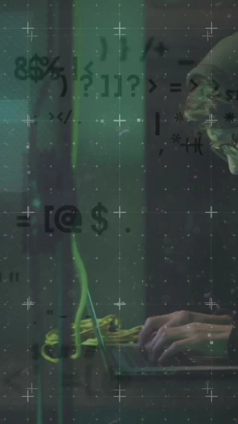 Animation of data over asian male hacker in hoodie using laptop by computer Stock Footage 342225375