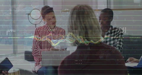 Animation of data processing against diverse colleagues passing documents and Stock Footage 245402705