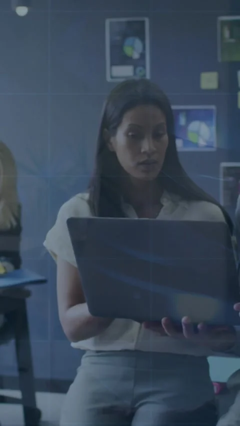Animation of data processing against diverse man and woman discussing over a Stock Footage 344723563