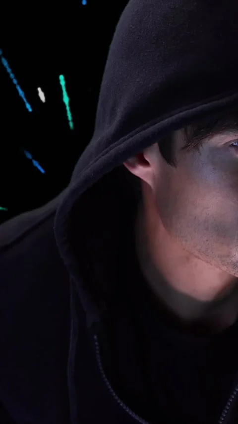 Animation of data processing and caucasian male hacker over black background Stock Footage 342676236