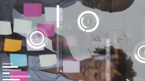 Animation of data processing and diagrams over diverse colleagues discussing Stock Footage 313355850
