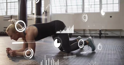 Animation of data processing and diagrams over caucasian woman exercising at gym 動画素材 328646972