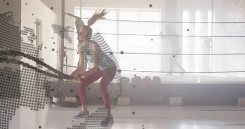 Animation of data processing and globe over caucasian woman exercising at gym Stock Footage 309169070