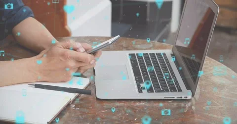 Animation of data processing and networks over man using smartphone and laptop Stock Footage 328299553