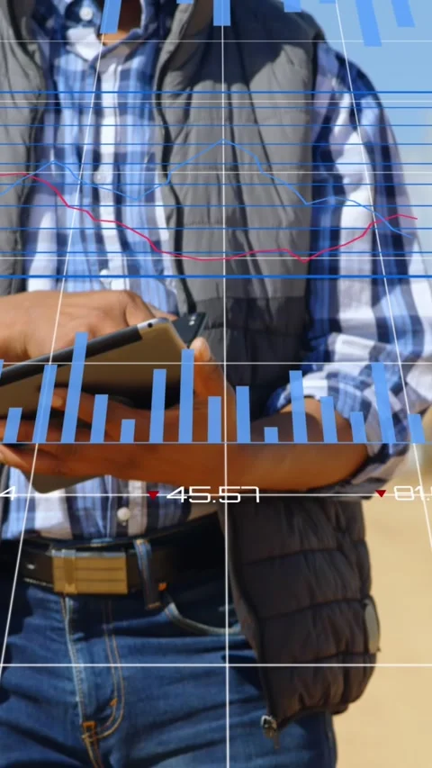 Animation of data processing and statistics over engineer using tablet Stock Footage 343608986