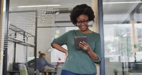 Animation of data processing and world map over casual businesswoman using 库存影片 310770752