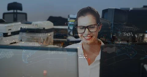 Animation of data processing and world map over caucasian woman using computer Stock Footage 329850217