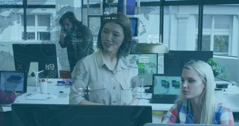 Animation of data processing and world map over two diverse female colleagues Stock Footage 330254761