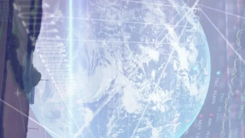Animation of data processing binary coding over globe and wind turbine Stock Footage 312471986