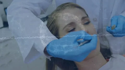 Animation of data processing with digital brain over diverse dentist and patient Видео 217997393