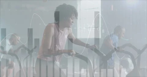 Animation of data processing on graph over woman cross training on elliptical at Stock Footage 328351799