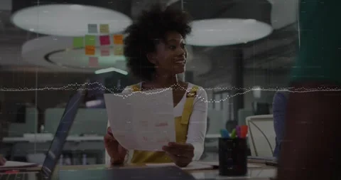 Animation of data processing over african american woman reading a document to Video stock 245402707