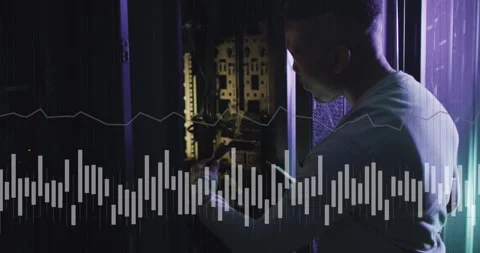 Animation of data processing over african american male it engineer and computer Stock Footage 328160499