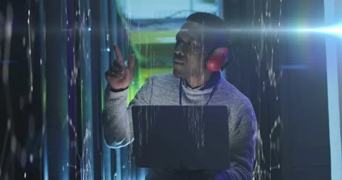 Animation of data processing over african american male it engineer and computer Stock Footage 328811126