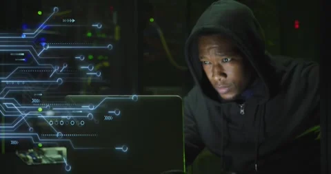 Animation of data processing over african american male hacker with computer and Stock Footage 329102609