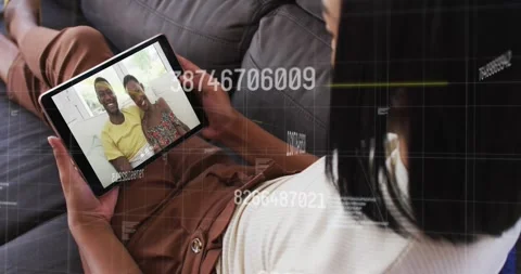 Animation of data processing over african american woman on tablet video call Stock Footage 329362616