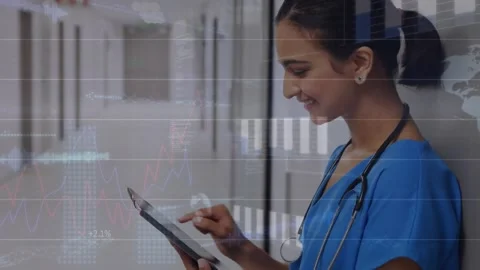 Animation of data processing over biracial female doctor using tablet Stock Footage 221290384