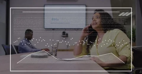 Animation of data processing over biracial woman with documents discussing with Stock Footage 253989557