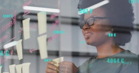 Animation of data processing over biracial woman taking notes in office Stock Footage 266180644