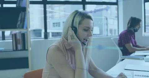 Animation of data processing over business people working in office Stock Footage 327524391