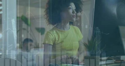Animation of data processing over businesswoman using computer Stock Footage 327278803