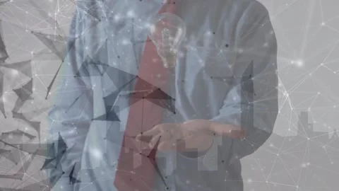 Animation of data processing over caucasian businessman with lightbulb Stock Footage 220358669
