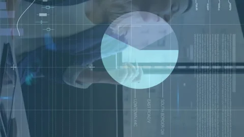 Animation of data processing over caucasian businesswoman using computer at Stock Footage 312441882