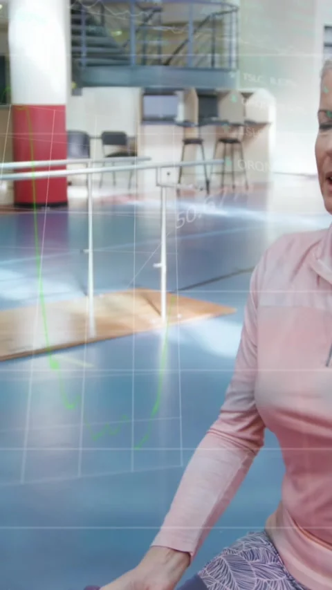 Animation of data processing over caucasian woman exercising Stock Footage 321666542