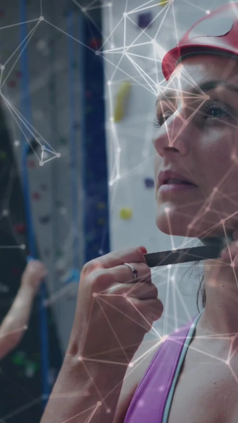 Animation of data processing over caucasian women climbing wall Stock Footage 323900159