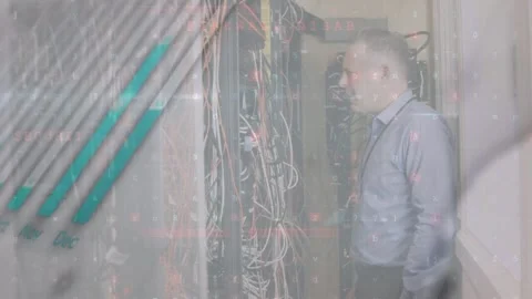 Animation of data processing over caucasian male worker in server room Stockbeeldmateriaal 326190075