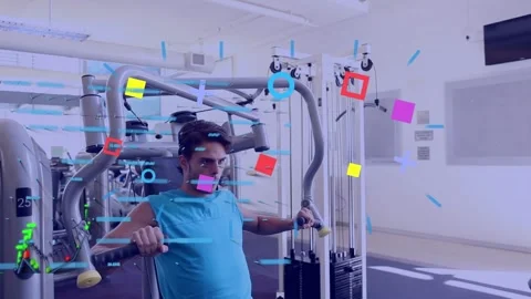 Animation of data processing over caucasian man exercising at gym Stock Footage 326874580