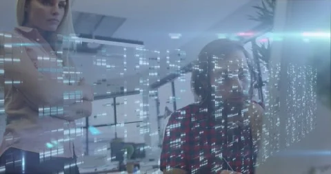 Animation of data processing over caucasian business people using computer in Stock Footage 327780981