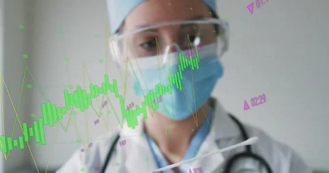 Animation of data processing over caucasian female doctor holding covid test Stock Footage 328315426