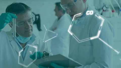 Animation of data processing over caucasian male scientists using test tube Stock Footage 328456096