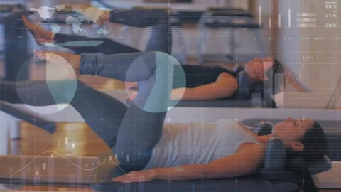 Animation of data processing over caucasian sportswomen exercising Stock Footage 329127745