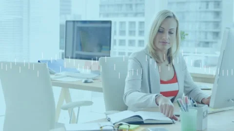 Animation of data processing over caucasian businesswoman using computer Stock Footage 330287954