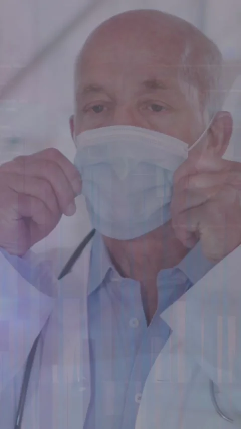 Animation of data processing over caucasian male doctor with face mask Stock-Footage 341927409