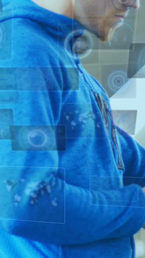 Animation of data processing over caucasian sportsman checking smartwatch Stock Footage 342953605