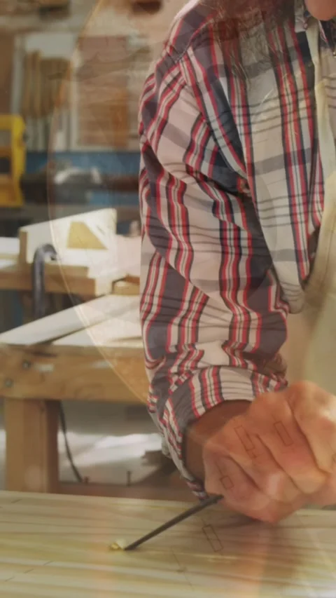 Animation of data processing over caucasian male carpenter working in workshop Stock Footage 343738407