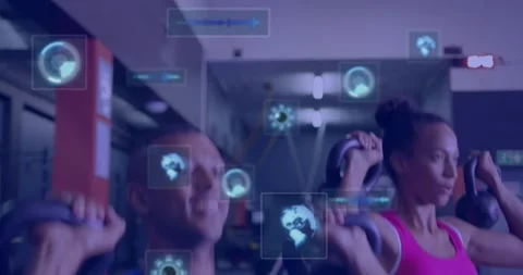 Animation of data processing over couple exercising at gym Stock Footage 330412900