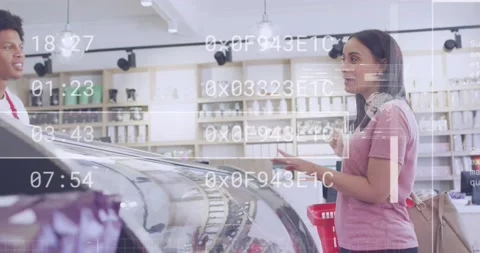 Animation of data processing over diverse shop assistant and customer talking Stock Footage 229196020